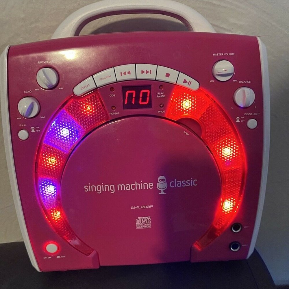 Singing Machine Portable Karaoke System SML-283P With Mic Included..